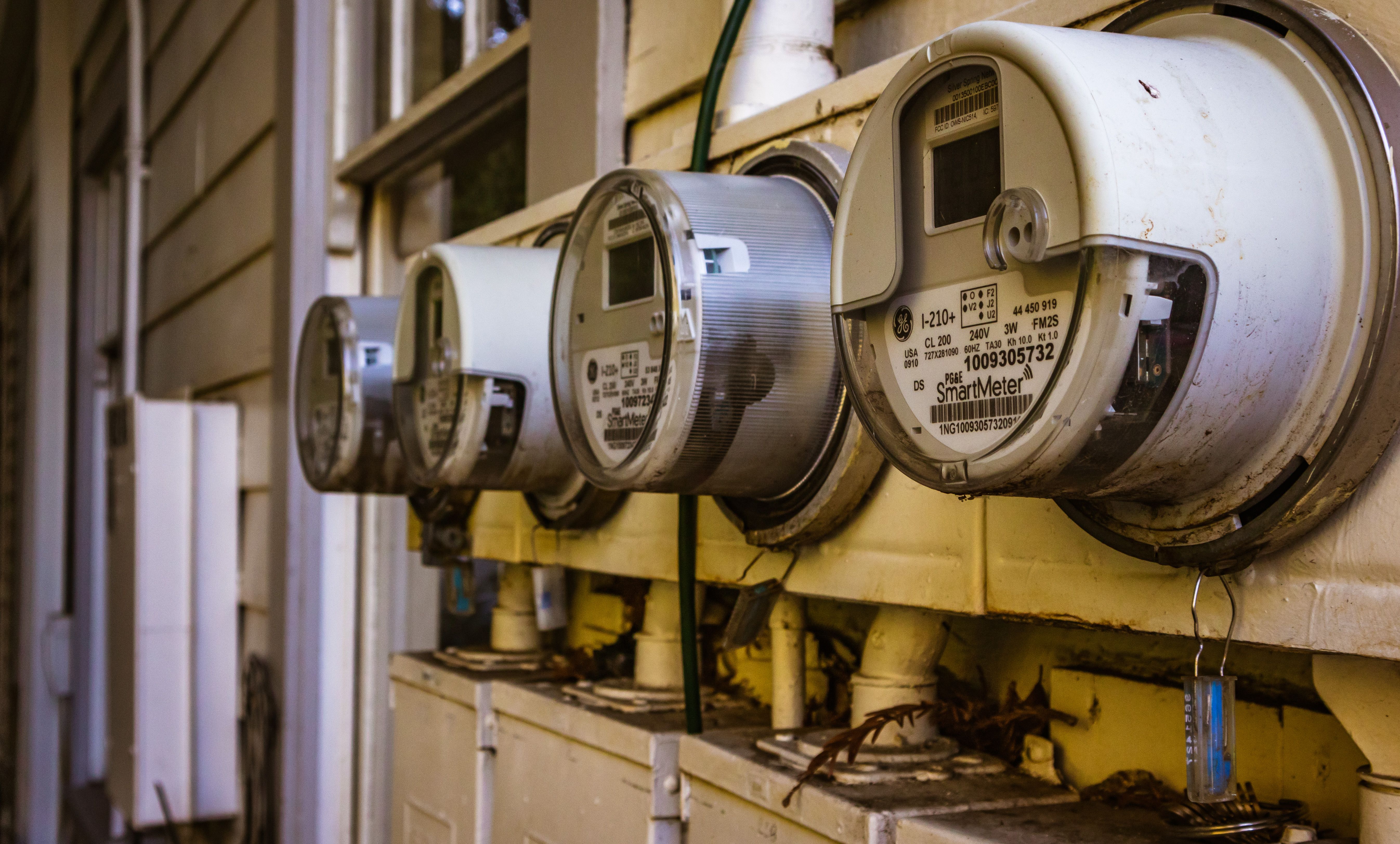 Professional electrician installing electrical panel and wiring